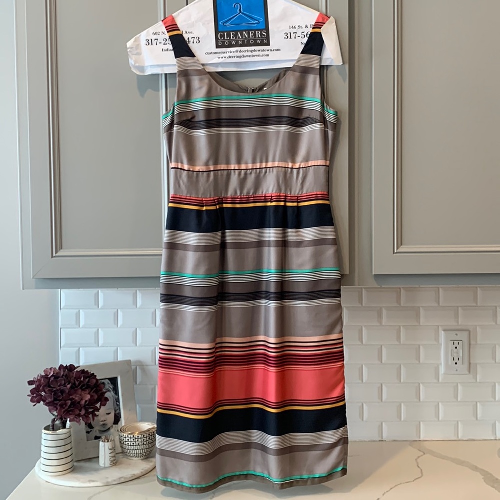 Beautiful multi colored dress. Size 2, dry cleaned.